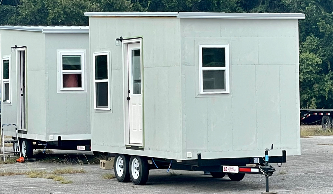 Two tiny houses on trailers