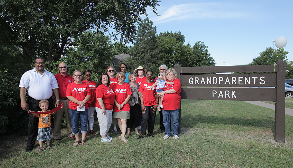 Grandparents With Grandkids Pose By Sign For Grandparents Park, Where We Live, Neighborhoods, Livable Communities