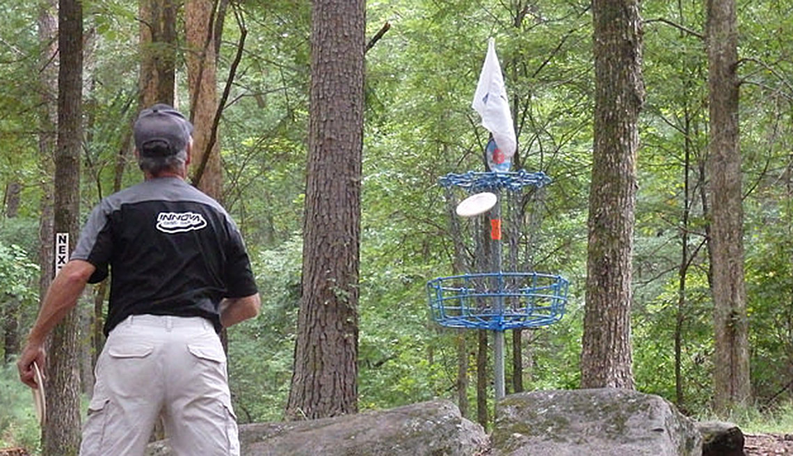 Man Plays Disc Golf In The Park, Outdoors, Frisbee, Basket, Trees, Forest, Age Friendly Games, Livable Communities