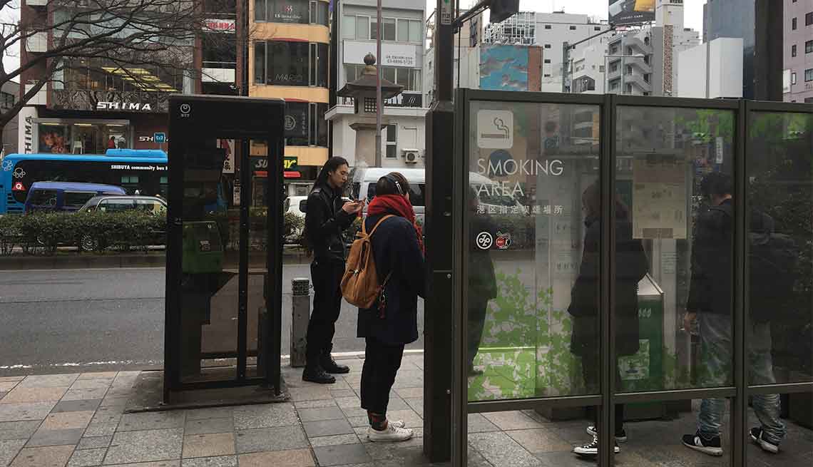A designated smoking area on a Tokyo street.