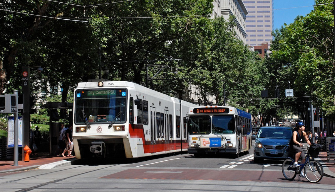 Streetcars, cars, pedestrians, buses and bicycles share the road in Portland, Oregon