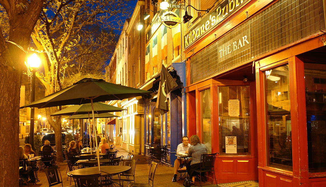 People in sidewalk cafes, evening, West Chester, Pennsylvania, AARP Livable Communities