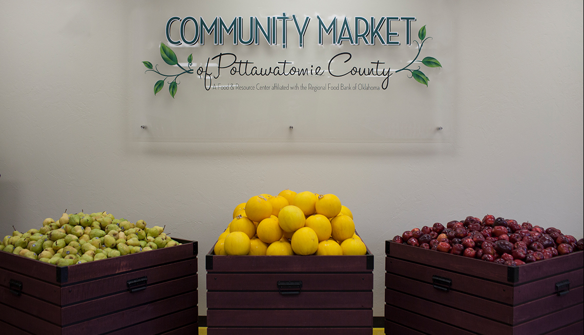 Fruit bins and a sign stating Community Market Pottawatomie County 