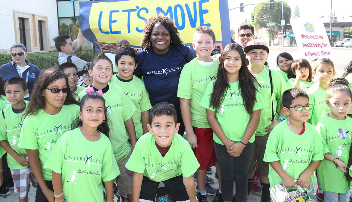 Fontana Mayor Acquanetta Warren joined by children participating in the annual Let’s Move on the Trail Event