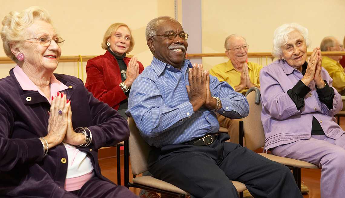 Seniors stretching, AARP Livable Communities, Key Indicators of Community Priorities