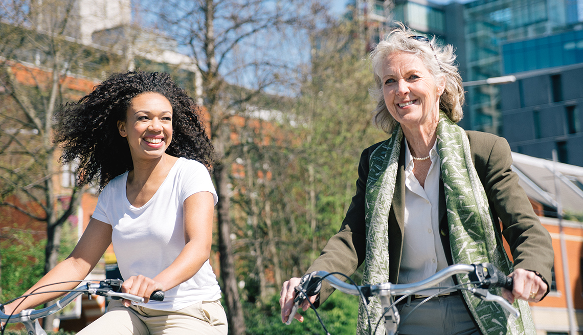 Women Ride Bicycles, City Environment, Sunny Outdoors, AARP Livable Communities Tool Kits Resources