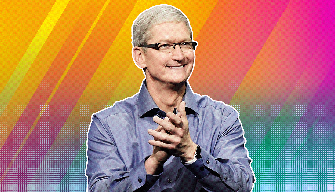 item 30 of Gallery image - tim cook smiling against rainbow ombre background