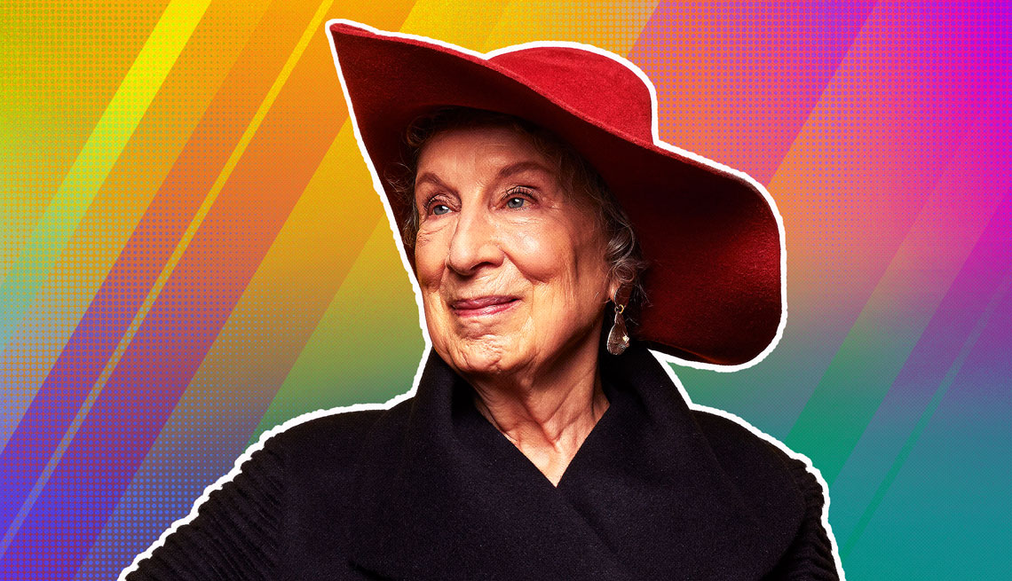 item 13 of Gallery image - Margaret Atwood in a red hat outlined against a rainbow ombre background