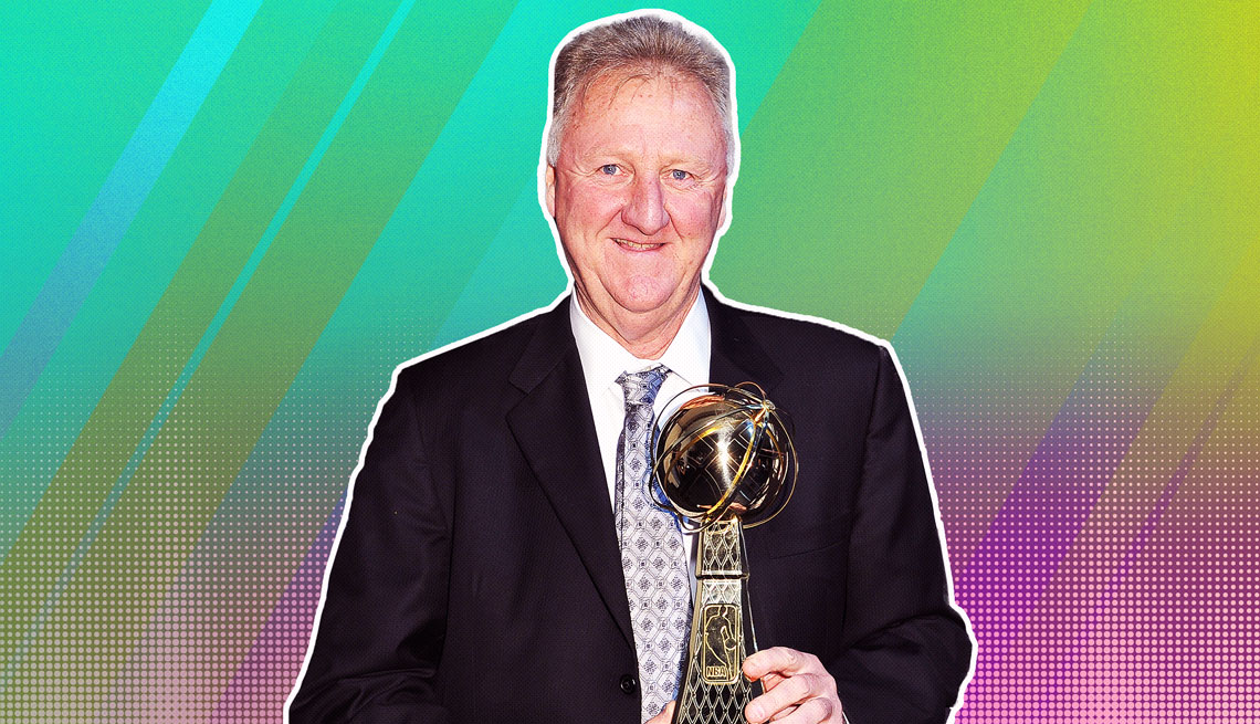 item 25 of Gallery image - Larry Bird holding trophy, outlined against a rainbow ombre background