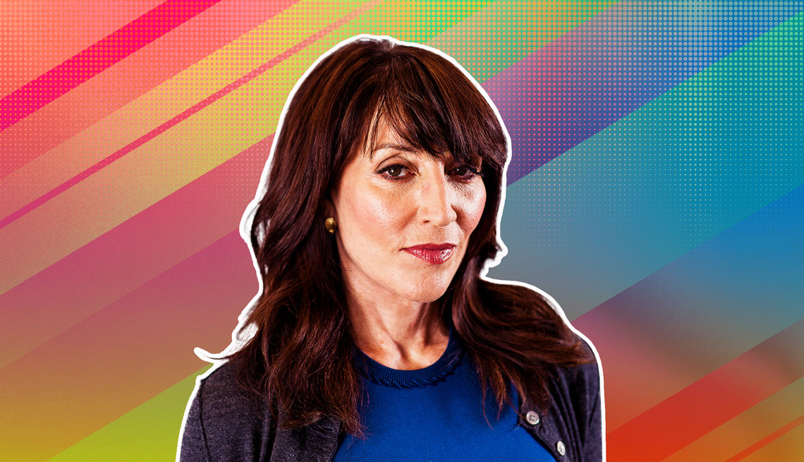 Katey Sagal outlined against a rainbow ombre background