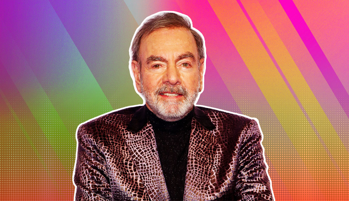 Neil Diamond outlined against a rainbow ombre background