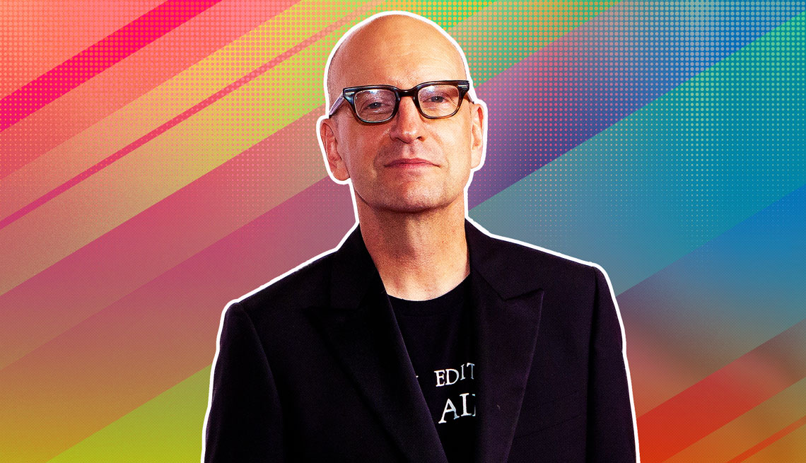 Steven Soderbergh outlined against a rainbow ombre background