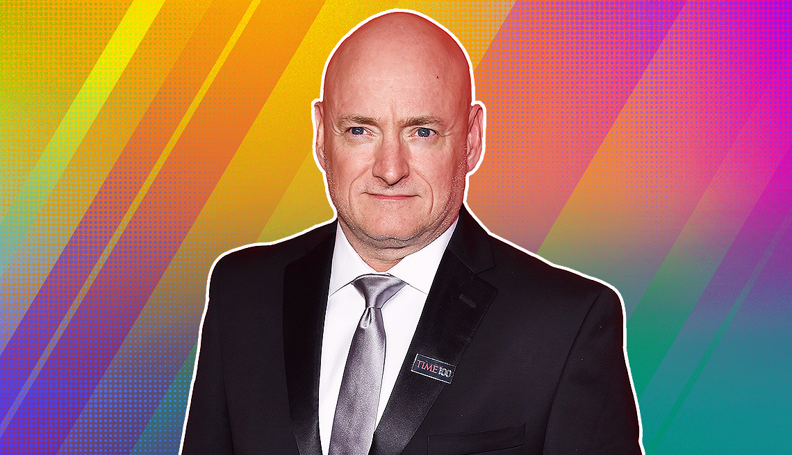 item 8 of Gallery image - Mark Kelly outlined against a rainbow ombre background