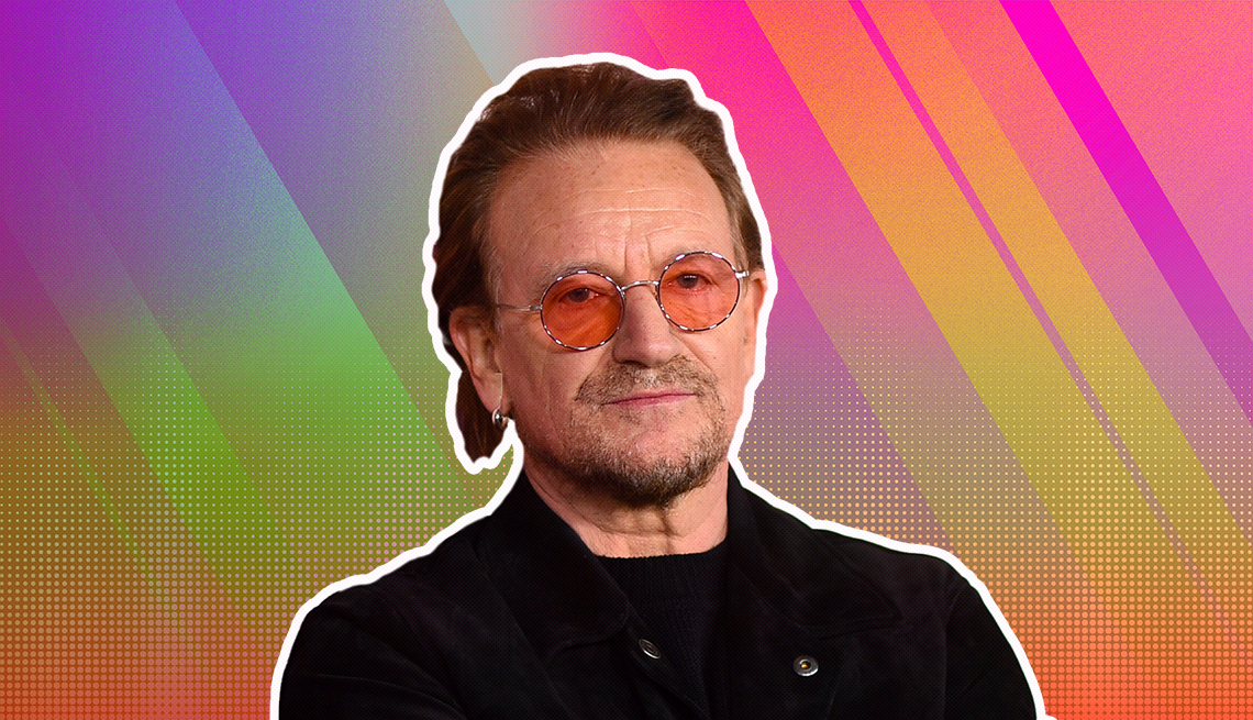 Bono outlined against a rainbow ombre background
