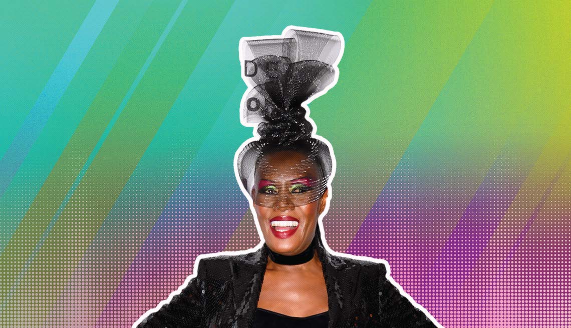Grace Jones outlined against a rainbow ombre background