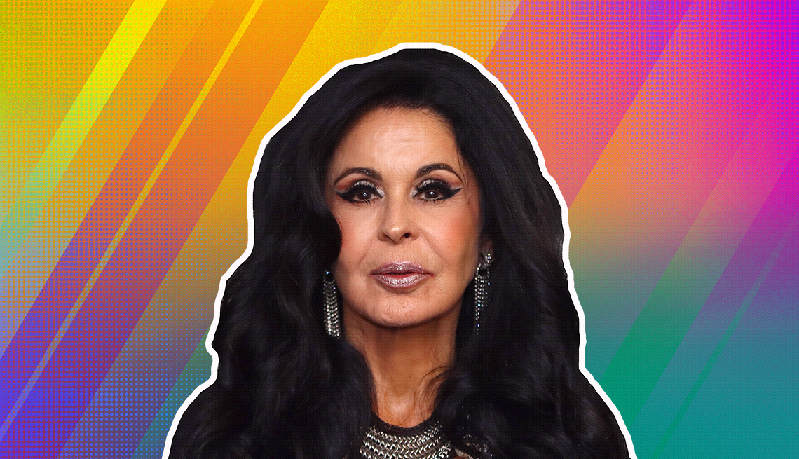 Maria Conchita Alonso outlined against a rainbow ombre background