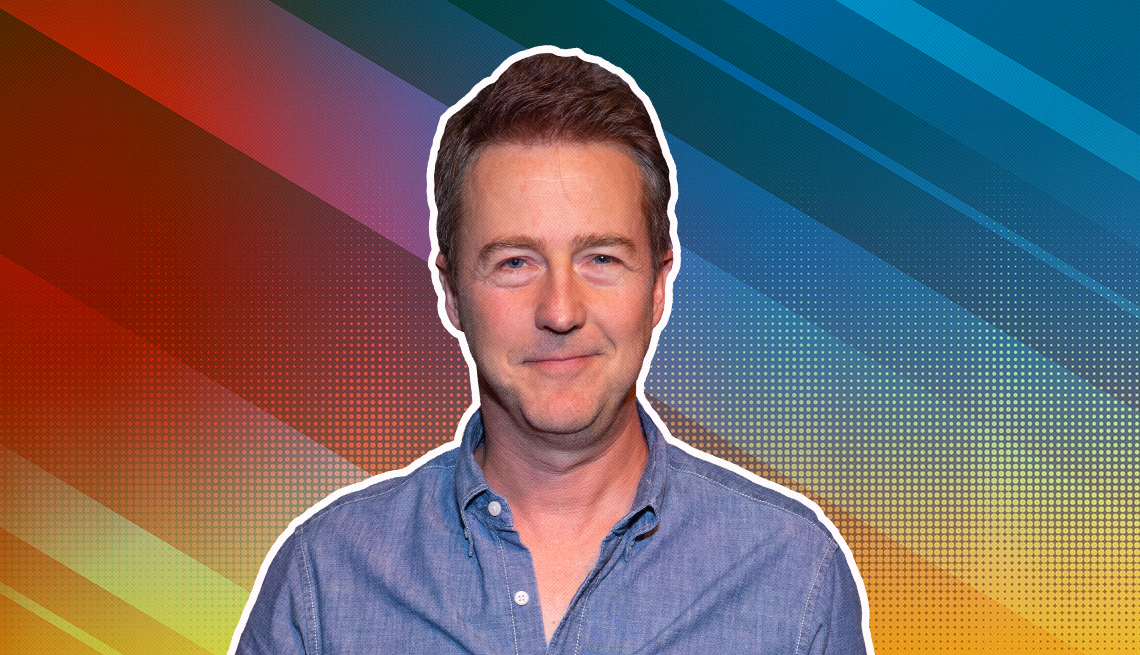 Edward Norton outlined against a rainbow ombre background