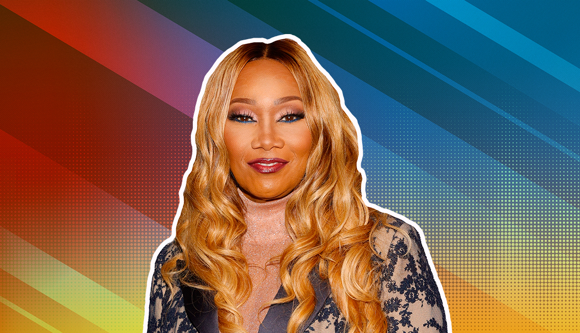 item 5 of Gallery image - Yolanda Adams outlined against a rainbow ombre background