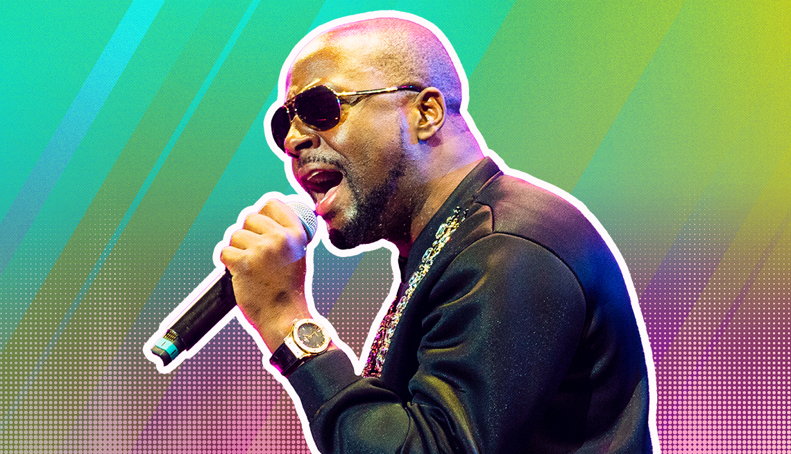 item 15 of Gallery image - wyclef jean singing into a microphone outlined against a rainbow ombre background