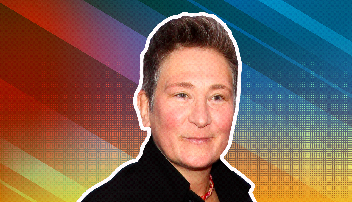 item 29 of Gallery image - K D lang outlined against a rainbow ombre background