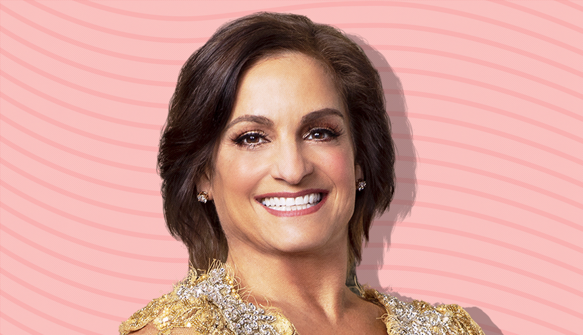 item 8 of Gallery image - mary lou retton against light pink background with curved lines going horizontally from one end to the other