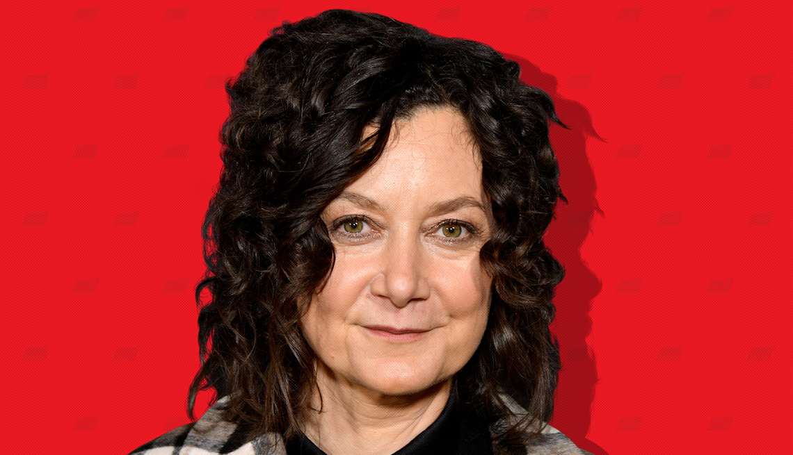 item 3 of Gallery image - sara gilbert against red background with mini shapes