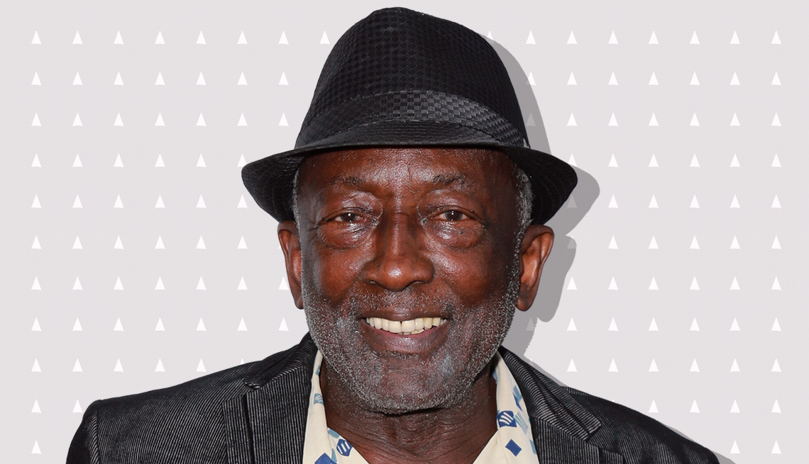 item 28 of Gallery image - garrett morris against light gray background with mini triangles