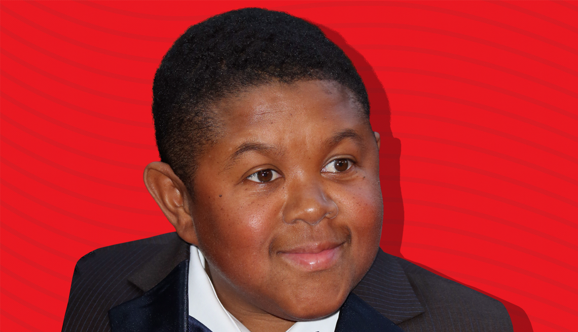 item 25 of Gallery image - emmanuel lewis against red background with curved lines going horizontally from one end to the other