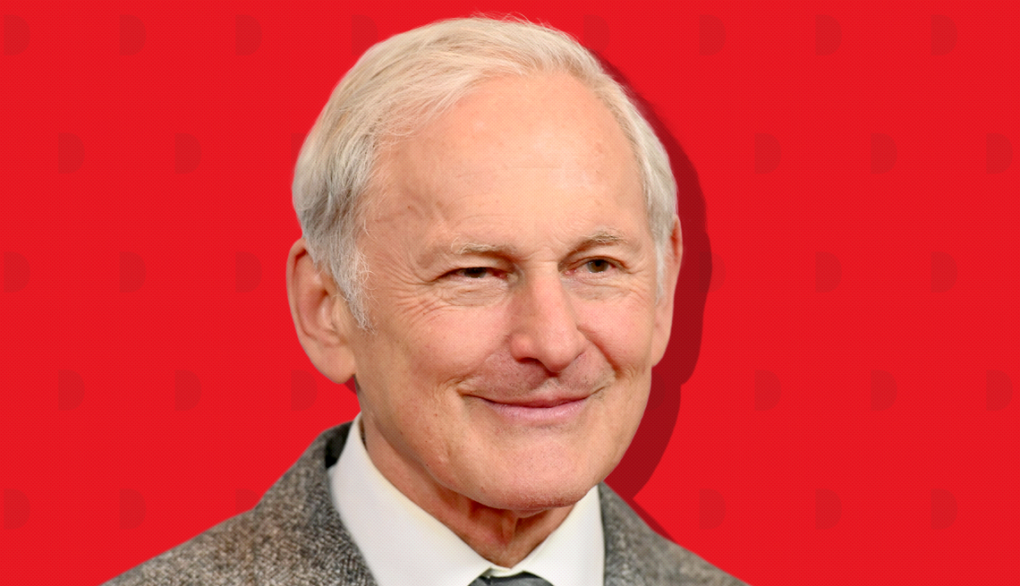 item 18 of Gallery image - victor garber against red background with mini shapes