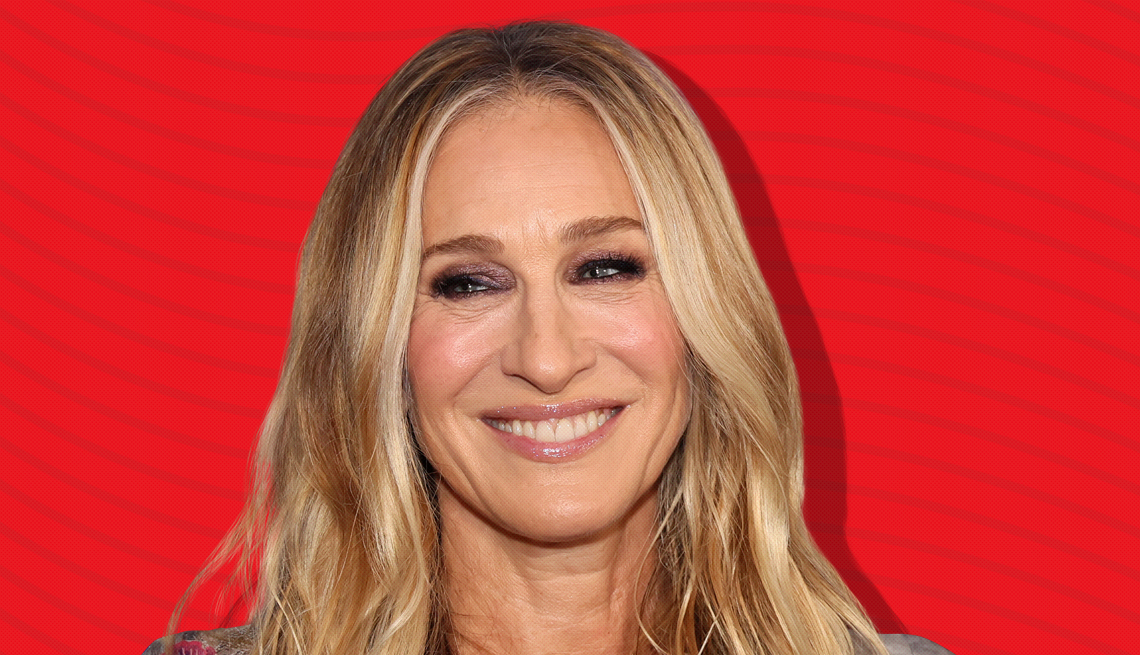 item 9 of Gallery image - sarah jessica parker against red background with curved lines going horizontally from one end to the other
