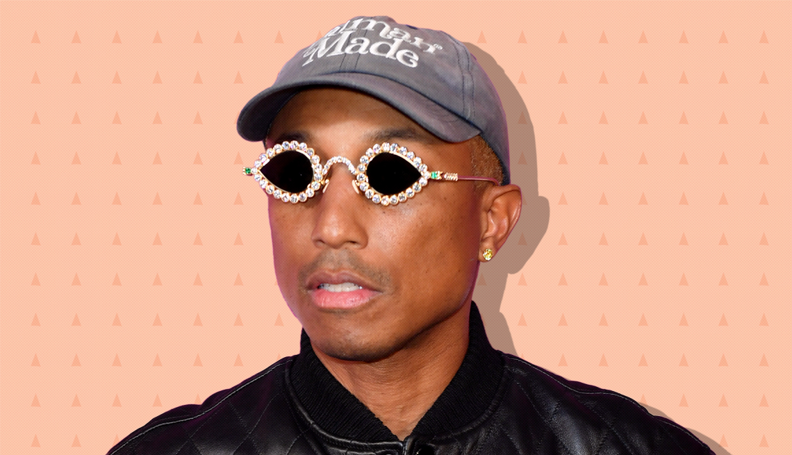 item 26 of Gallery image - pharrell williams on peach colored background with mini triangles