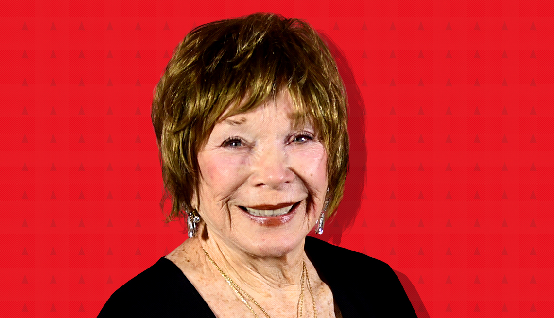 item 7 of Gallery image - shirley maclaine against red background with mini triangles