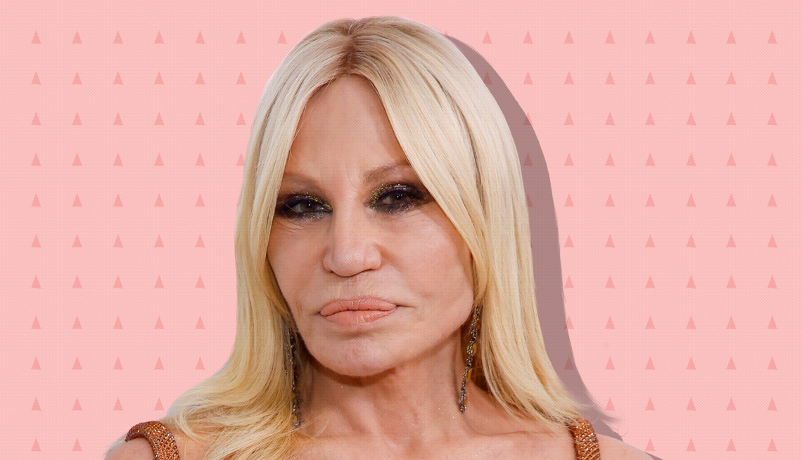 item 30 of Gallery image - donatella versace against light pink background with mini triangles