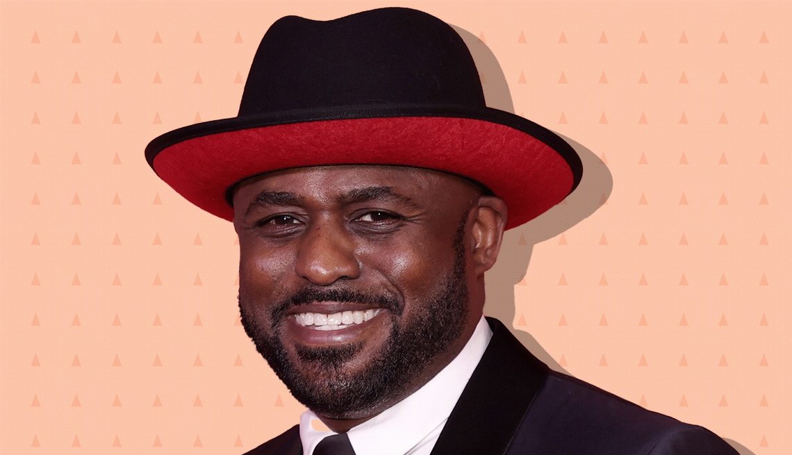 item 29 of Gallery image - wayne brady on peach colored background with mini triangles