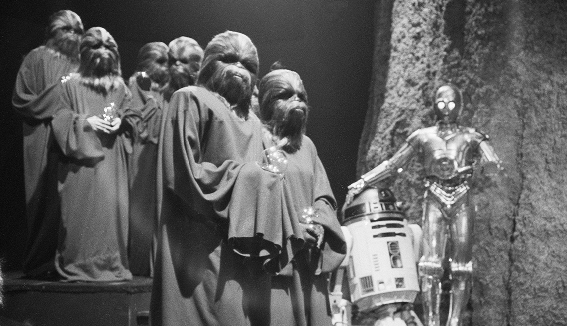 item 14 of Gallery image - Scene from Wookie Life Day Ceremony in 1978 'Star Wars Holiday Special' with wookies in robes, R2-D2 and C-3P0