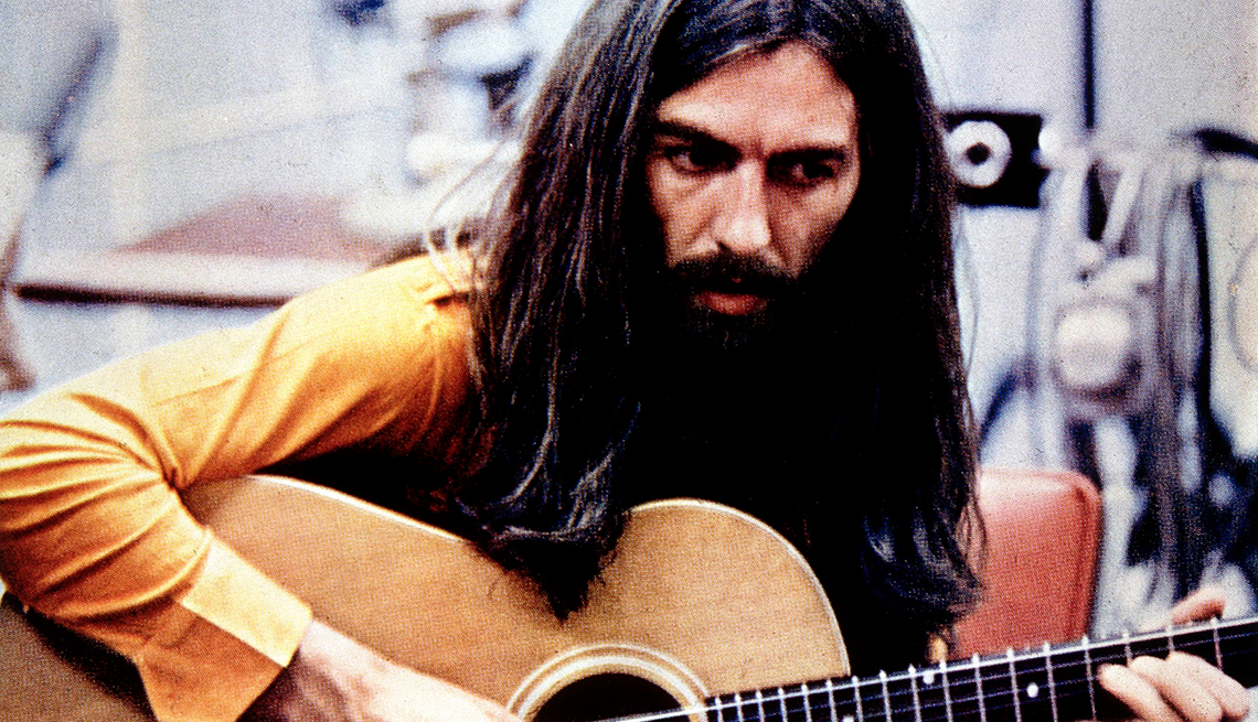 item 8 of Gallery image - George harrison playing acoustic guitar,