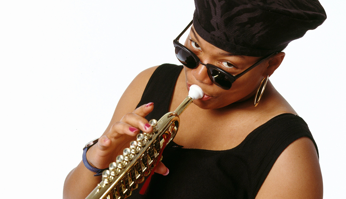item 3 of Gallery image - Queen Latifah playing the sax