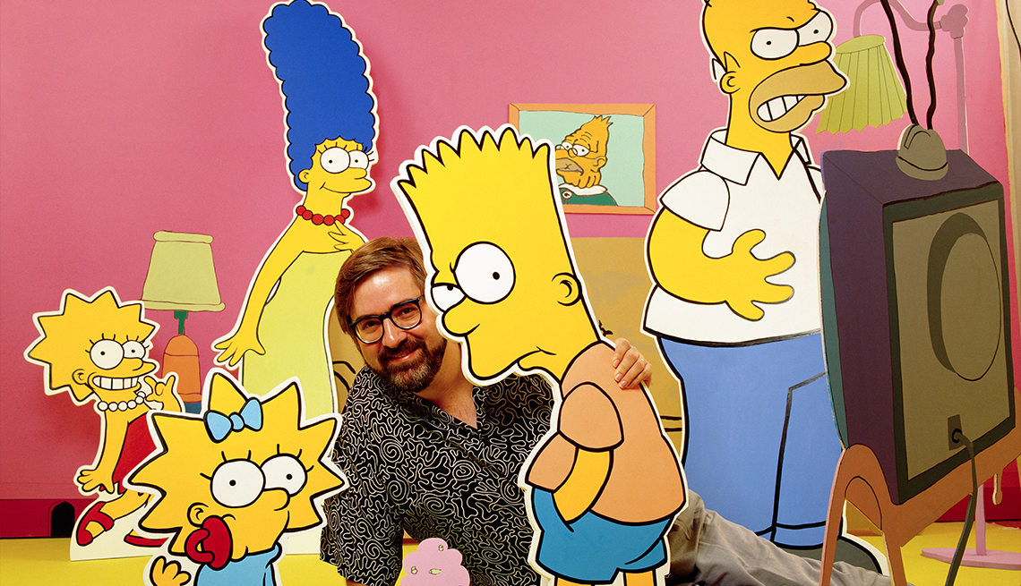 item 15 of Gallery image - Simpsons creator Matt Groening poses with cardboard cutouts of Homer, Marge, Bart, Lisa and Maggie Simpson