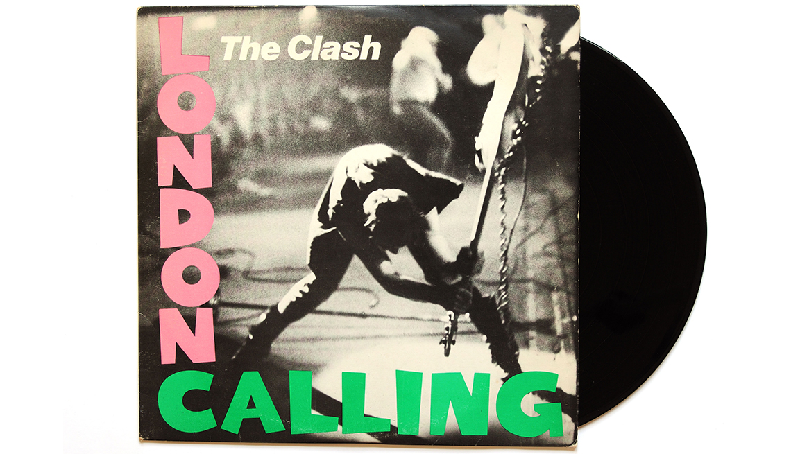 item 18 of Gallery image - The Clash 'London Calling' album cover with part of a record showing