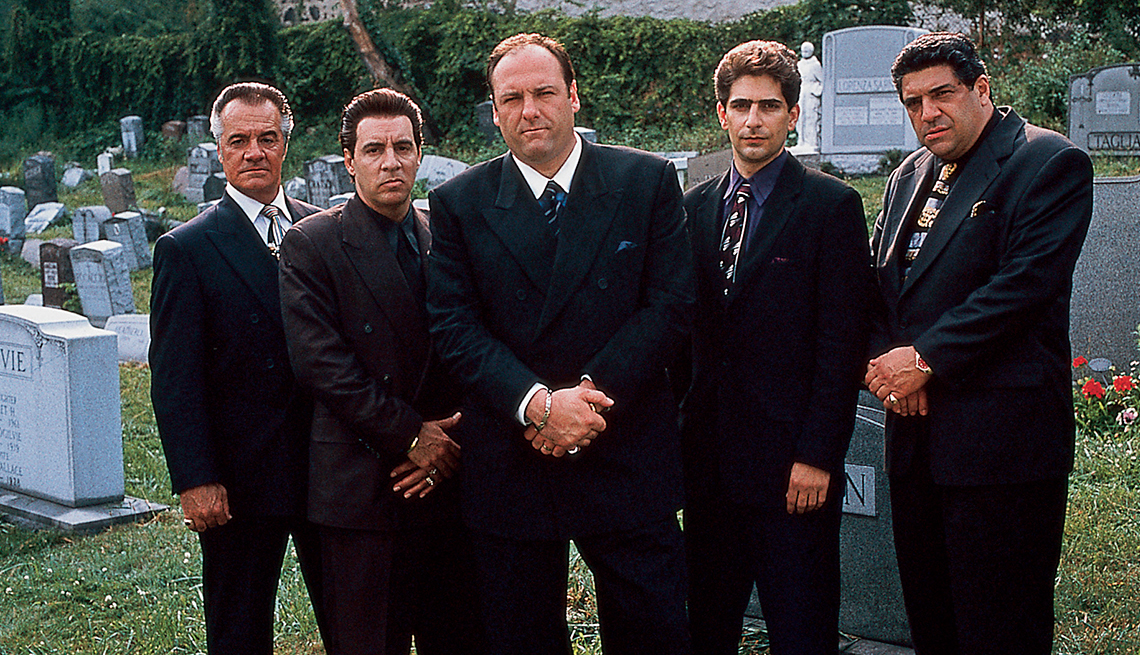 Sopranos cast members Tony Sirico, Silvio Dante, James Gandolfini, Christopher Imperioli and Vincent Pastor stand in a line in a cemetery