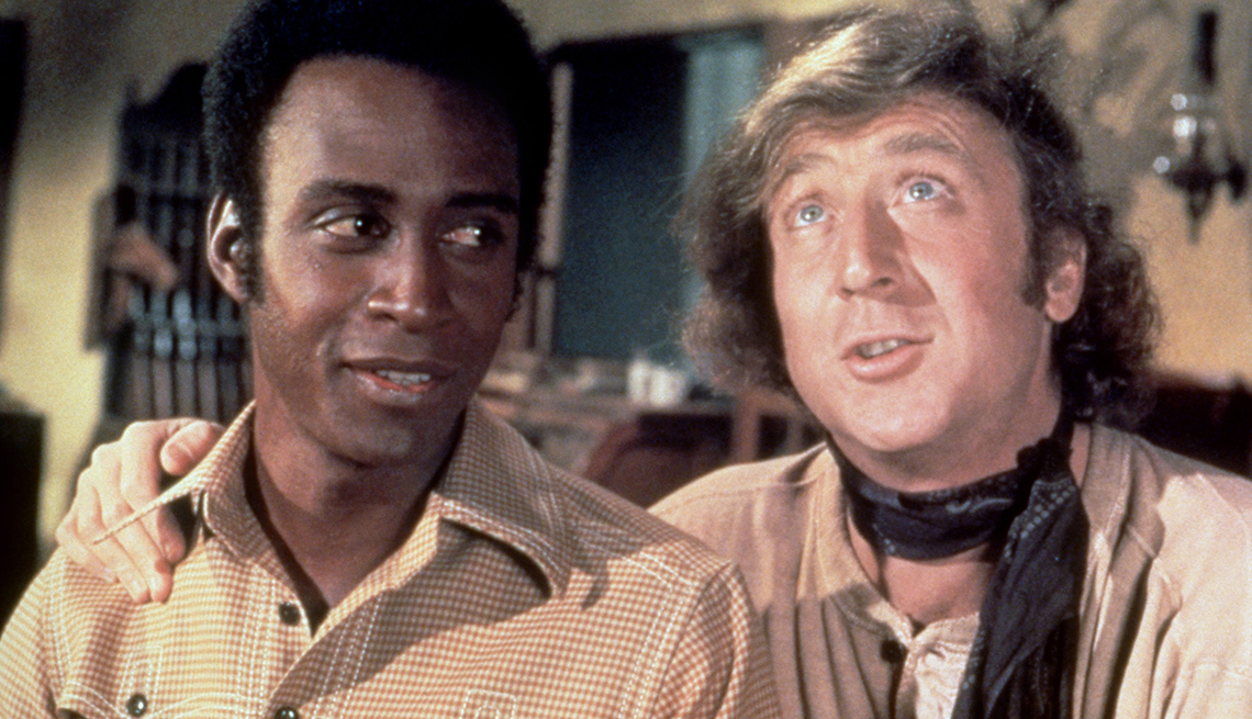 item 22 of Gallery image - Cleavon Little and Gene Wilder in cowboy costumes on the set of 'Blazing Saddles'