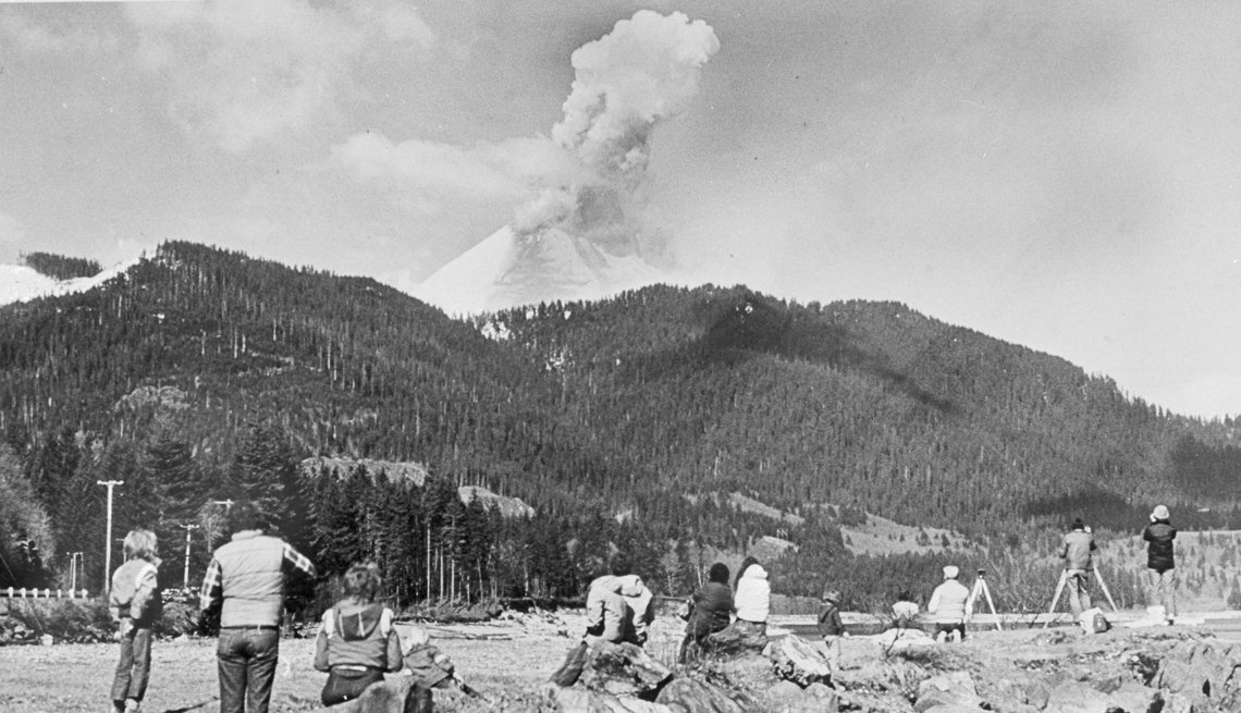item 5 of Gallery image - People stand by watching as Mount St. Helens erupts in 1980