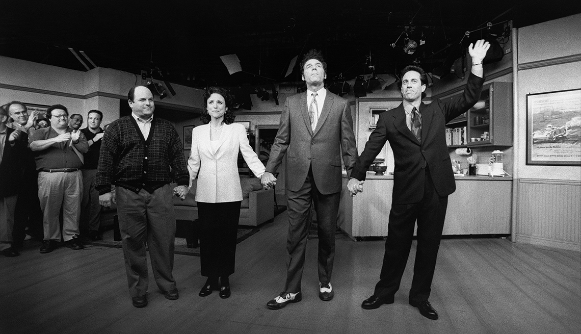 item 5 of Gallery image - Pictured: (l-r) Jason Alexander as George Costanza, Julia Louis-Dreyfus as Elaine Benes, Michael Richards as Cosmo Kramer, Jerry Seinfeld as Jerry Seinfeld 