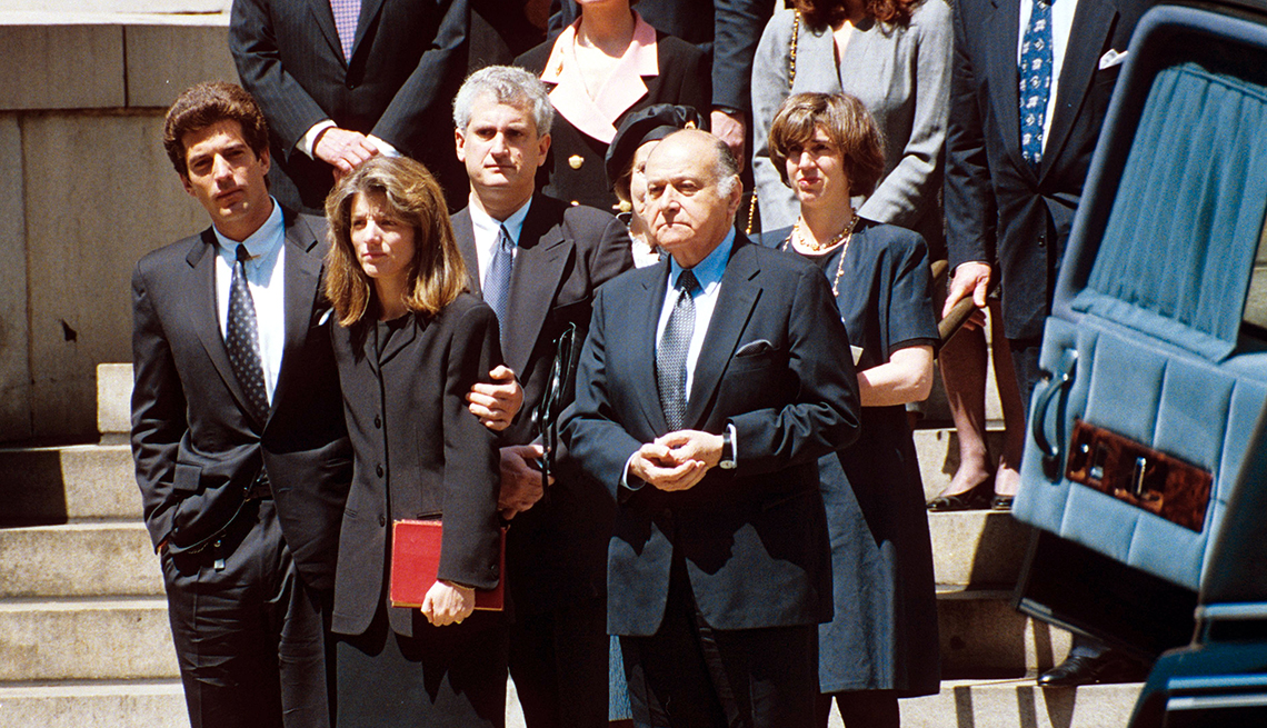 item 2 of Gallery image - Jacqueline Kennedy Onassis’ family at her funeral May 23, 1994.