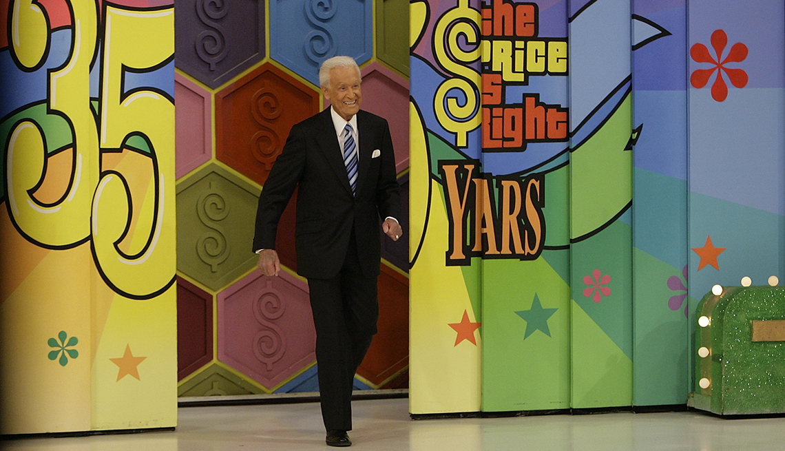 item 12 of Gallery image - Bob Barker walks on stage at "The Price is Right " TV game show.