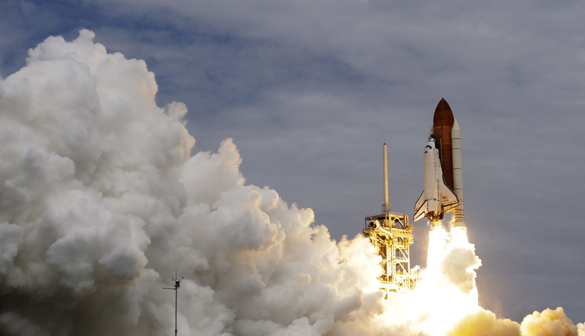 item 24 of Gallery image - The space shuttle Atlantis lifts off from the Kennedy Space Center Friday, July 8, 2011