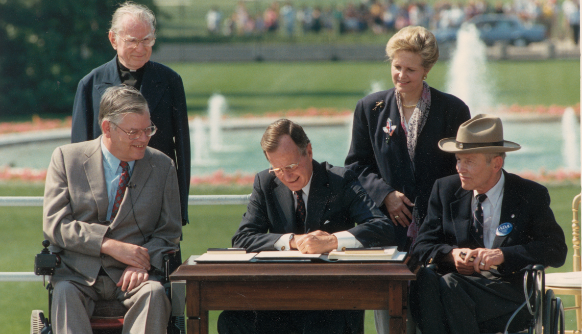 item 6 of Gallery image - George Bush signs the Americans with Disabilities Act of 1990
