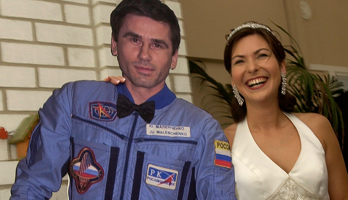 Russian cosmonaut Yuri Malenchenko becomes the first person to get married in space (2003) 