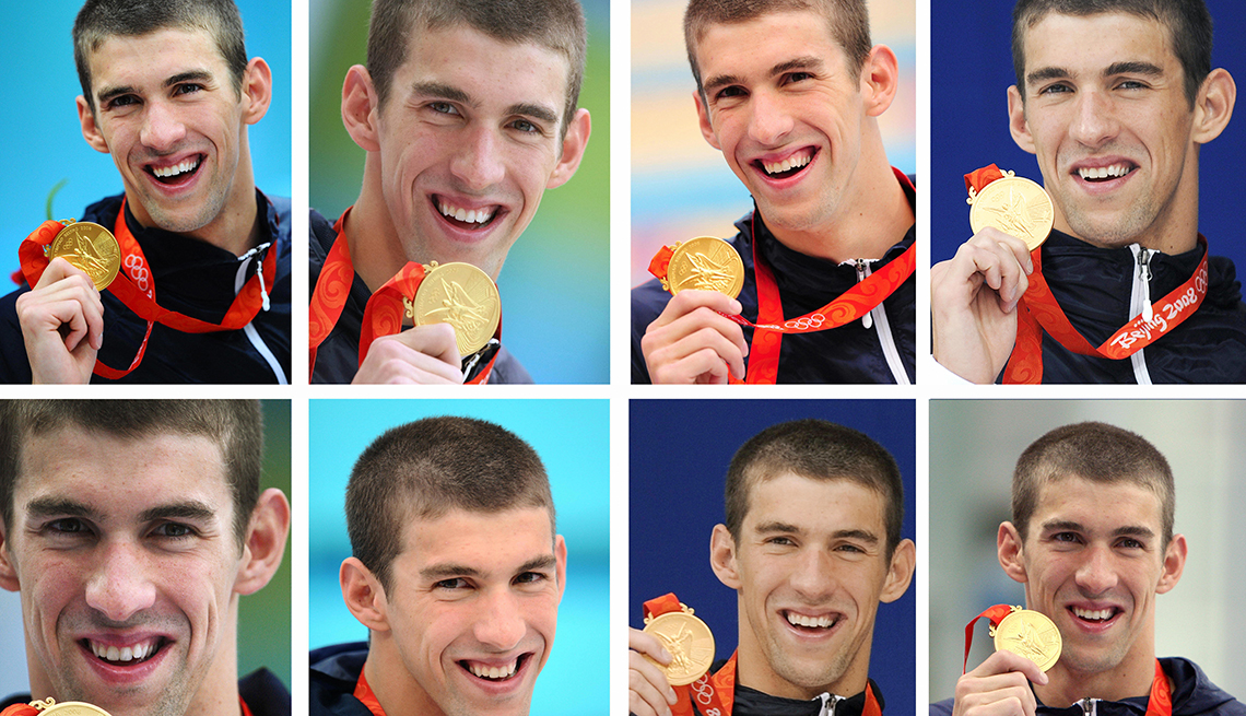 Michael Phelps with gold medals