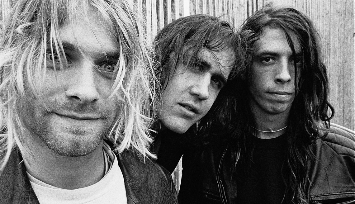 item 7 of Gallery image - Nirvana pose backstage at the Reading Festival